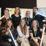 Gruppenfoto der sieben organisierenden Personen der SKGM 2025.